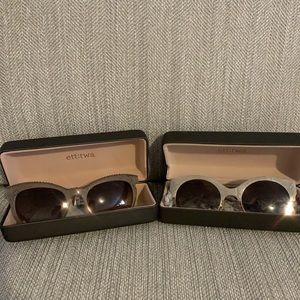 2 pair of ett:twa sunglasses.